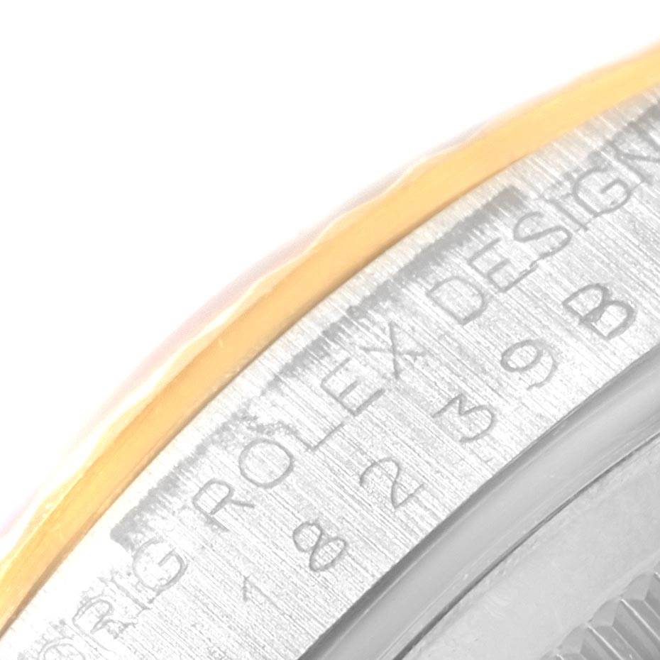 This image shows a close-up angle of the case side with engraving details of a Rolex President 18239 Men
s White Gold Mother of Pearl Dial 18239 Men
s White Gold Mother of Pearl Dial model watch.