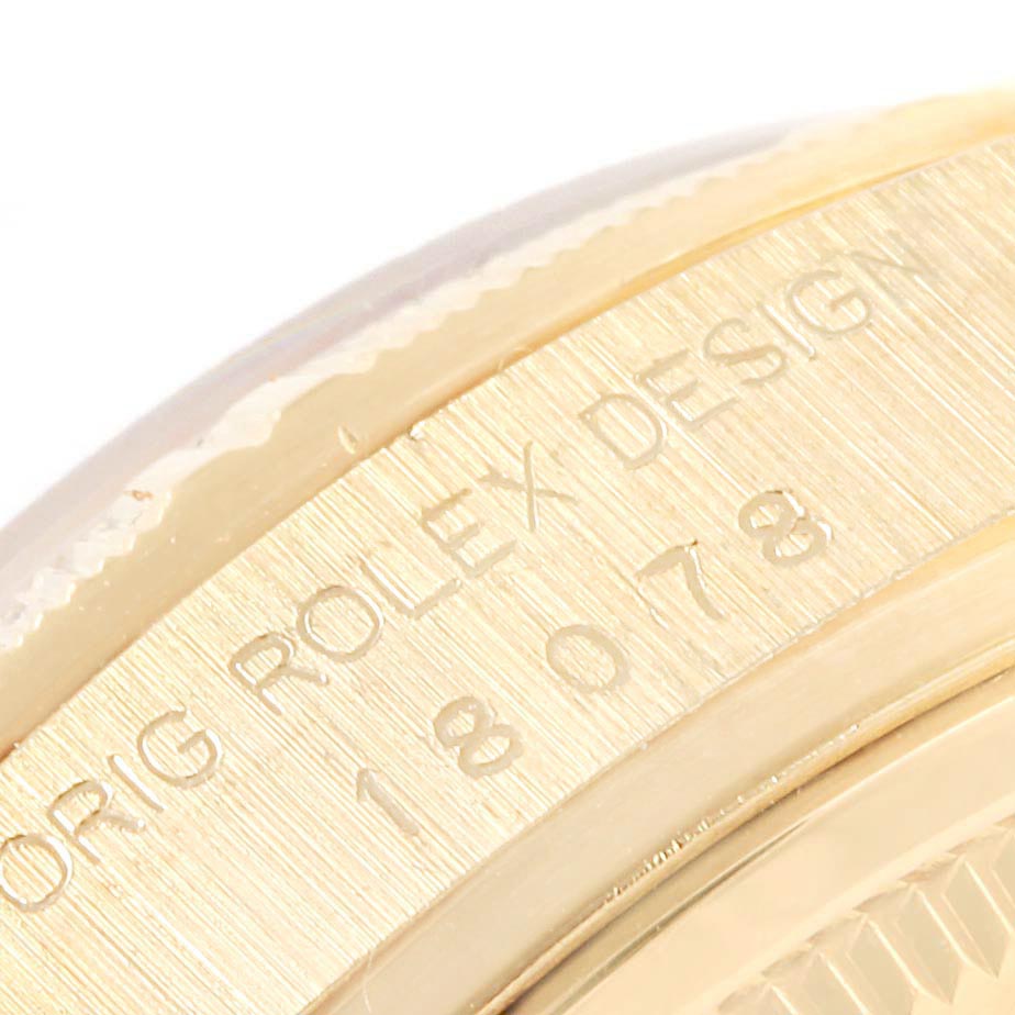 The image shows a close-up of the side engraving on a Rolex President 18078 Men's Yellow Gold Champagne Dial 18078 Men's Yellow Gold Champagne Dial model watch with details like "ORIG ROLEX DESIGN" and the model number "18078."
