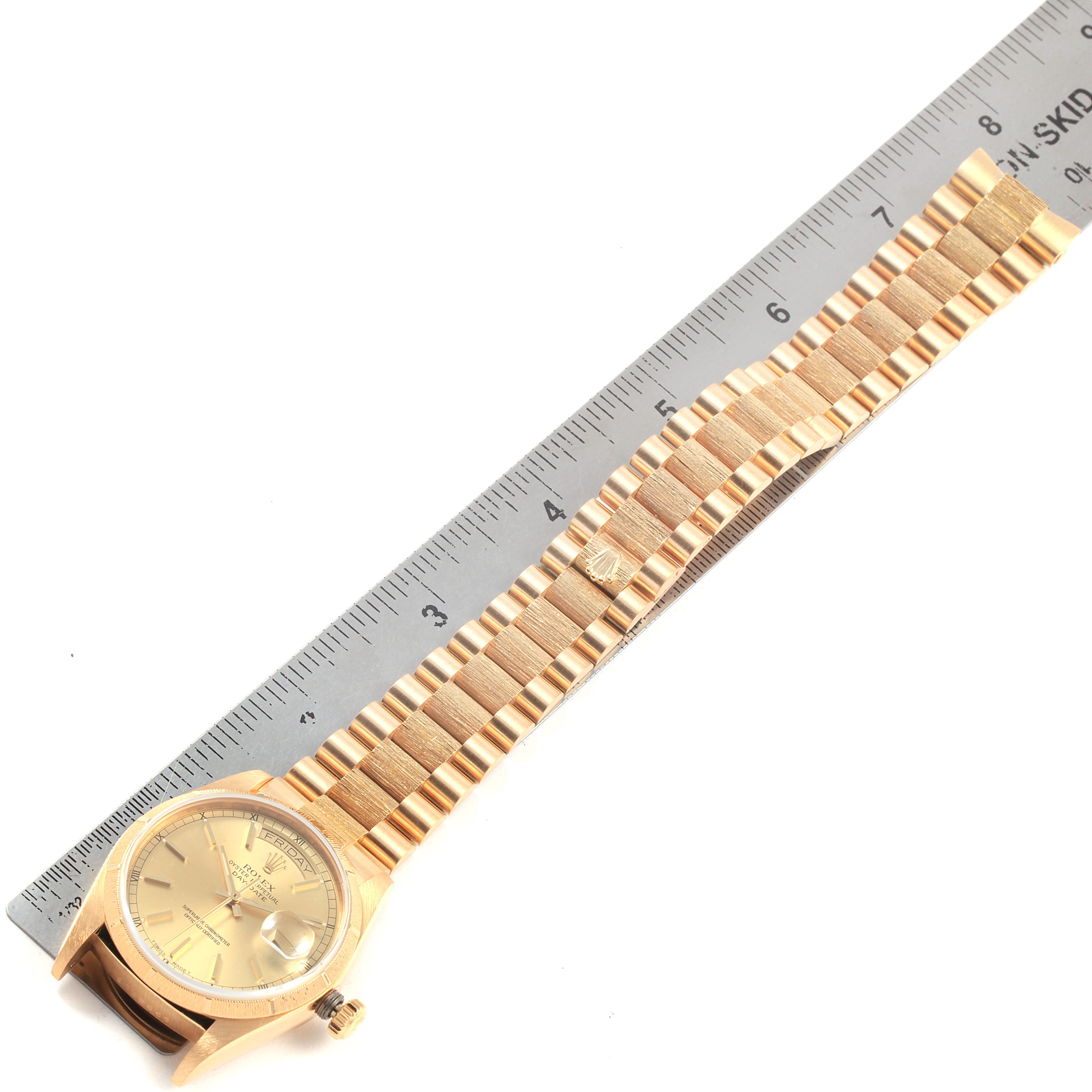 This image shows a Rolex President 18078 Men's Yellow Gold Champagne Dial 18078 Men's Yellow Gold Champagne Dial model watch from a top-down angle, displaying the face, bracelet, and a ruler for measurement.
