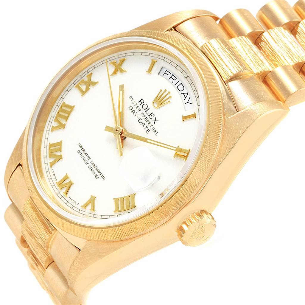 The image shows a Rolex President 18078 Men's Yellow Gold White Dial 18078 Men's Yellow Gold White Dial model watch at an oblique angle, highlighting the face, crown, and part of the bracelet.