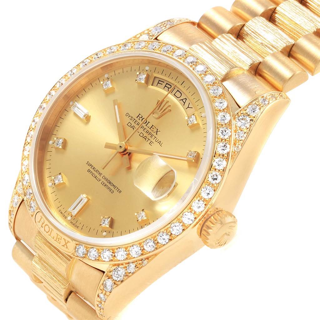 The image shows a Rolex President 18138 Men
s Yellow Gold Champagne Dial 18138 Men
s Yellow Gold Champagne Dial model watch at an angle highlighting its gold band, diamond-studded bezel, and day-date dial.