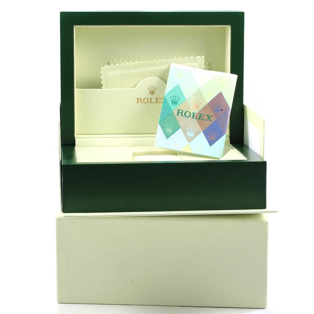 The image shows an open packaging box for a Rolex President 118238 Men's Yellow Gold White Dial 118238 Men's Yellow Gold White Dial model, including a polishing cloth and booklet.