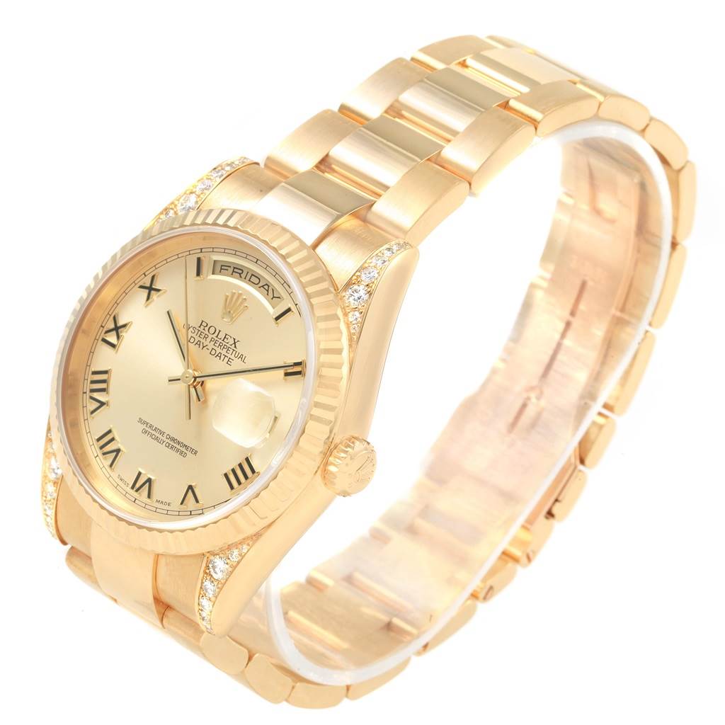 The Rolex President 118338 Men
s Yellow Gold Champagne Dial 118338 Men
s Yellow Gold Champagne Dial model is shown at an oblique angle featuring the face, bezel, crown, and part of the bracelet.