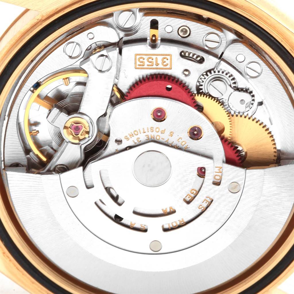 The image shows the internal mechanical movement of a Rolex President 118338 Men
s Yellow Gold Champagne Dial 118338 Men
s Yellow Gold Champagne Dial model watch viewed from the back.