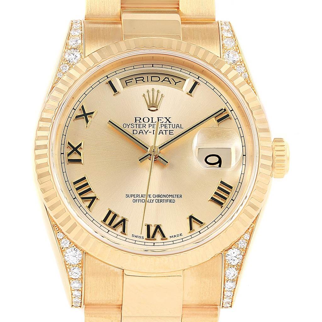 This image shows a close-up of the Rolex President 118338 Men
s Yellow Gold Champagne Dial 118338 Men
s Yellow Gold Champagne Dial Day-Date watch, highlighting the watch face, bezel, and part of the bracelet.