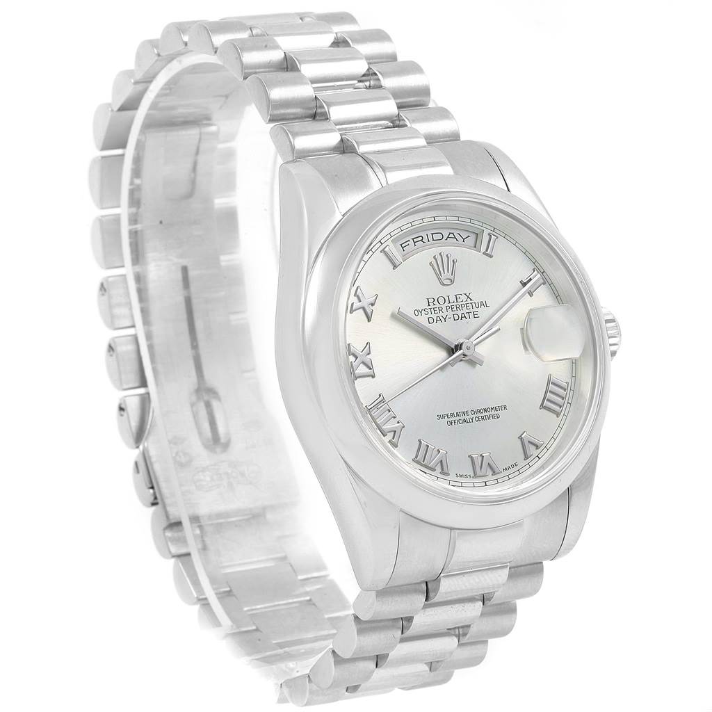 The image shows a front angle of a Rolex President 118206 Men's Platinum Blue Dial 118206 Men's Platinum Blue Dial model watch, highlighting the face, bezel, bracelet, and clasp.