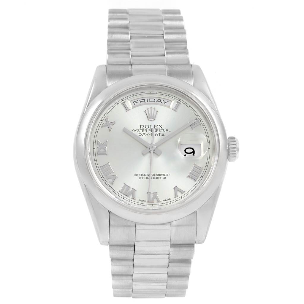 This image shows a front view of a Rolex President 118206 Men's Platinum Blue Dial 118206 Men's Platinum Blue Dial model watch, featuring its bracelet, dial, day, and date display.