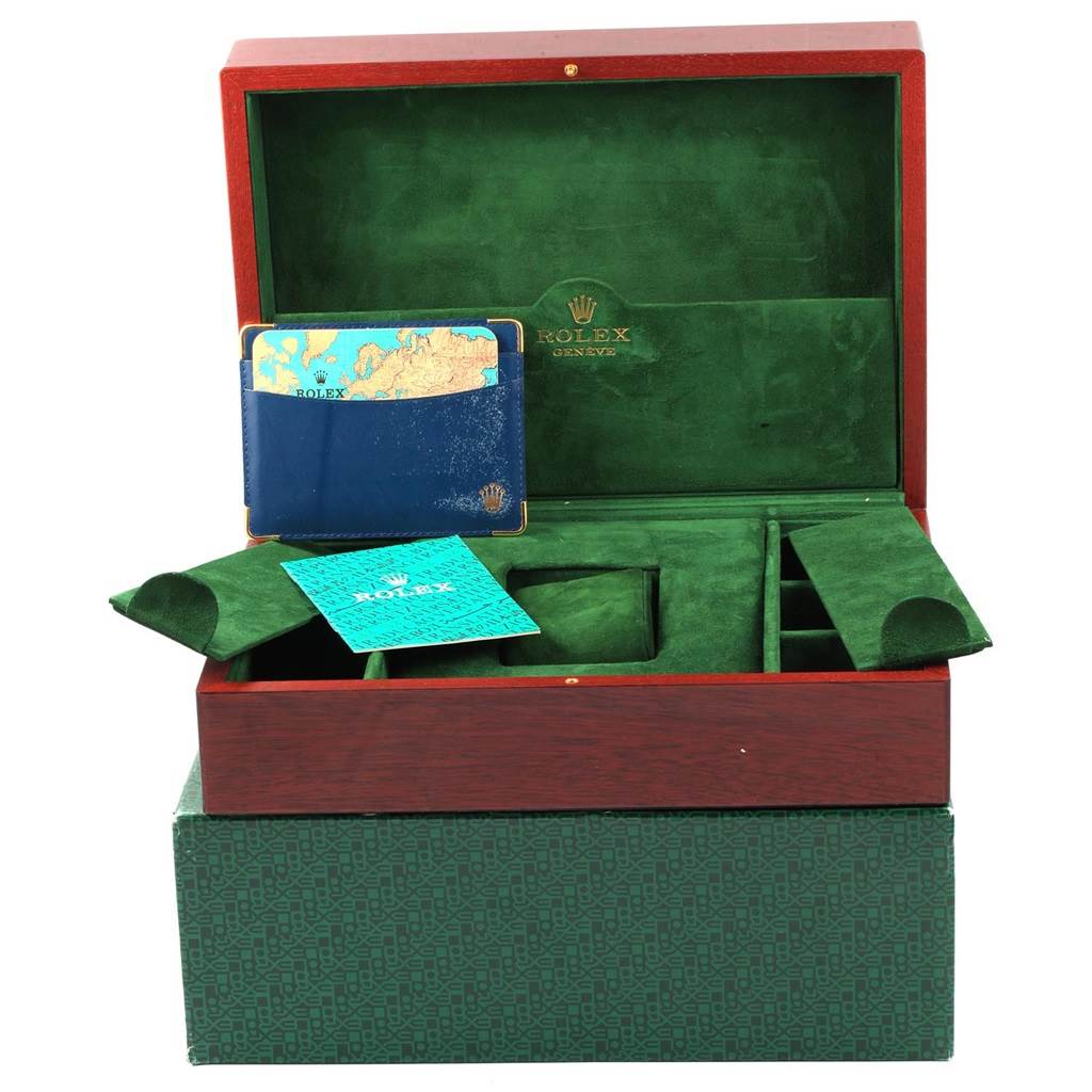 The image shows a Rolex President 118206 Men's Platinum Blue Dial 118206 Men's Platinum Blue Dial model watch box, with a green interior, a booklet, and a card holder.