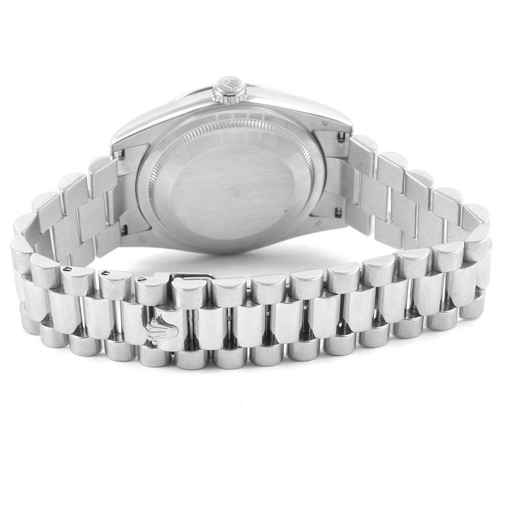 The image shows the back view of a Rolex President 118206 Men's Platinum Blue Dial 118206 Men's Platinum Blue Dial model watch, highlighting its case back and bracelet clasp.