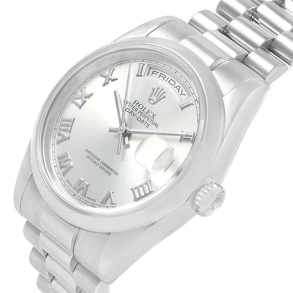 This image shows a close-up angle of the Rolex President 118206 Men's Platinum Blue Dial 118206 Men's Platinum Blue Dial model watch, highlighting its dial, crown, and part of the bracelet.