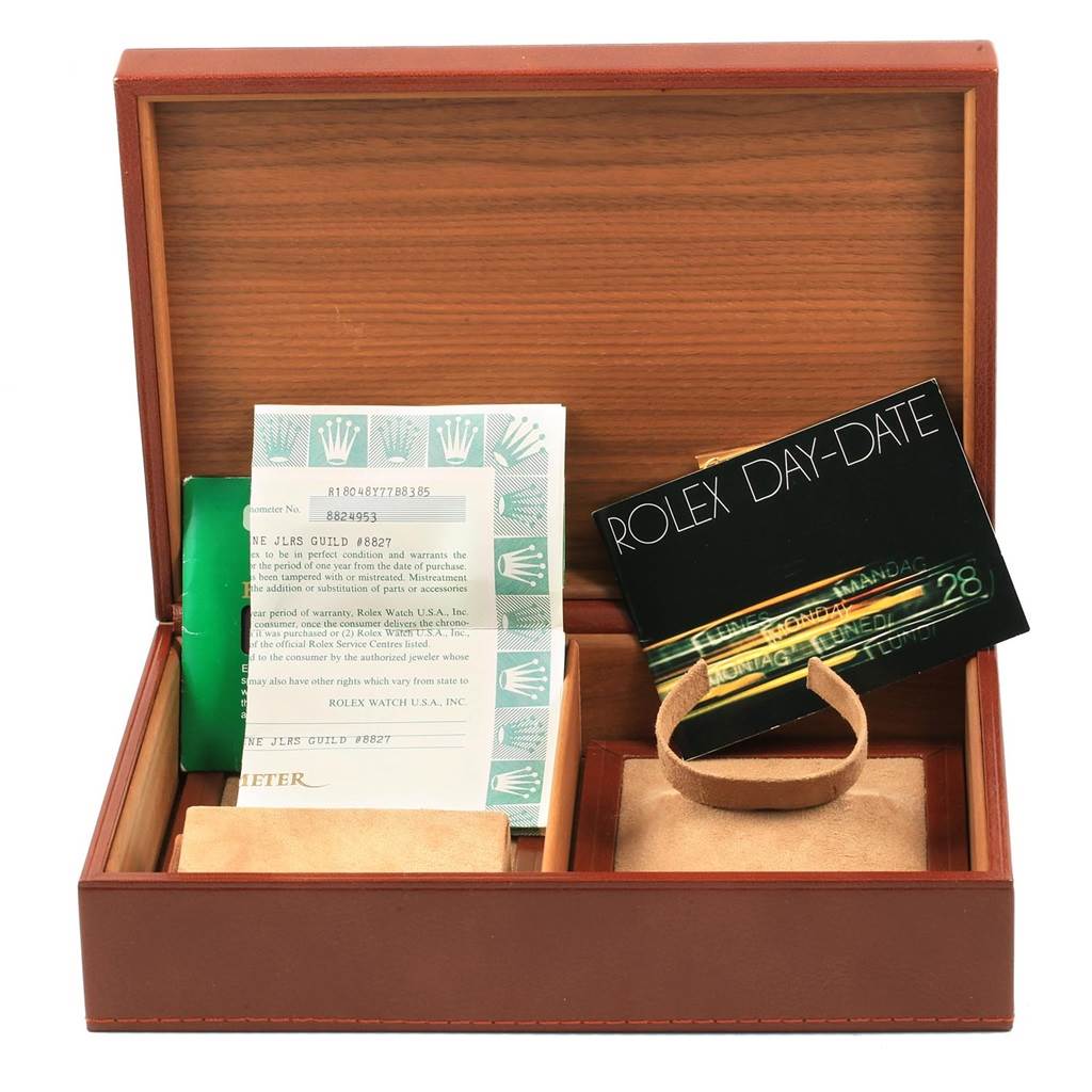 The image shows an open Rolex President 18048 Men
s Yellow Gold Champagne Dial 18048 Men
s Yellow Gold Champagne Dial model watch box containing booklets and documents.