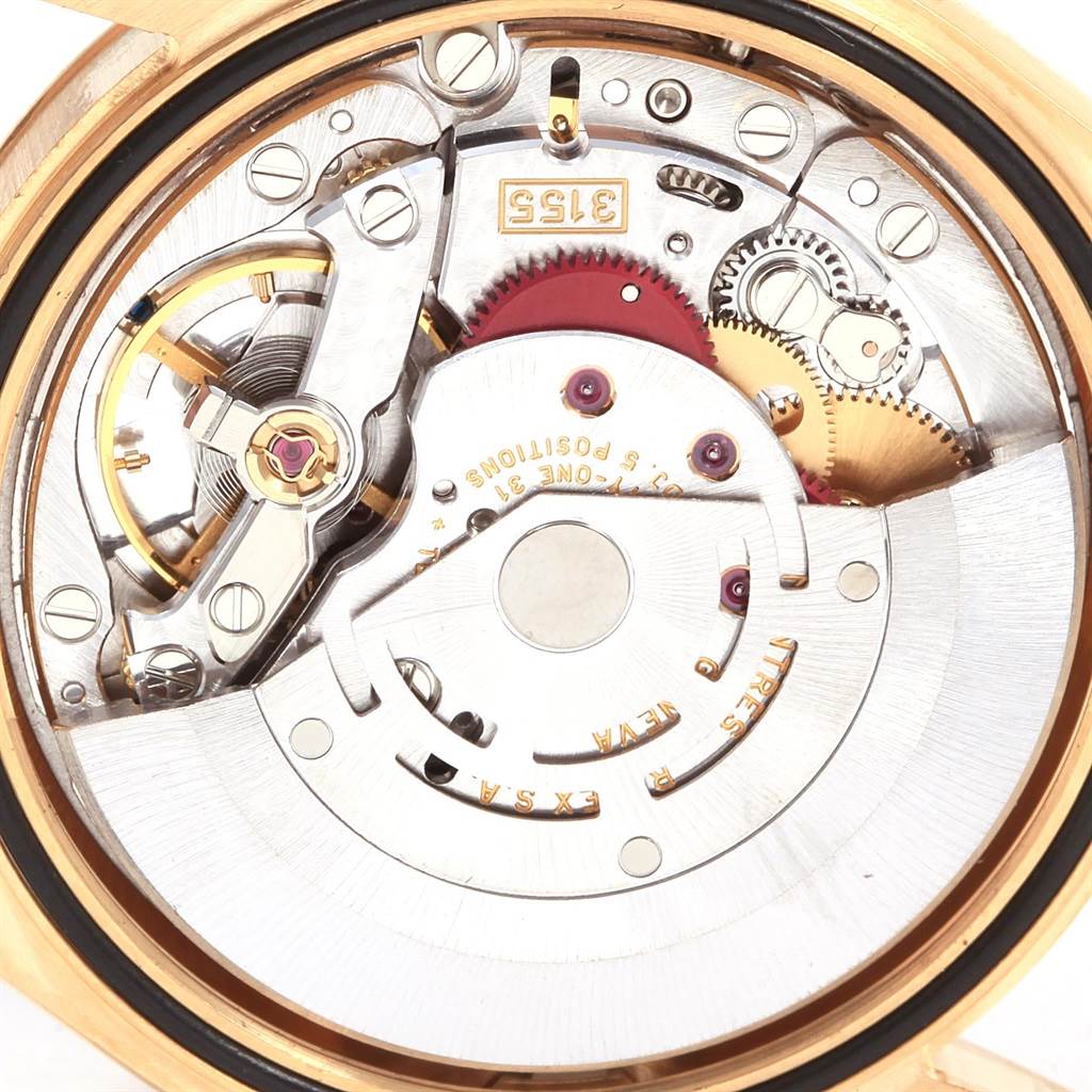 The image shows the inner mechanical movement of a Rolex President 118238 Men
s Yellow Gold Champagne Dial 118238 Men
s Yellow Gold Champagne Dial model watch viewed from the back.
