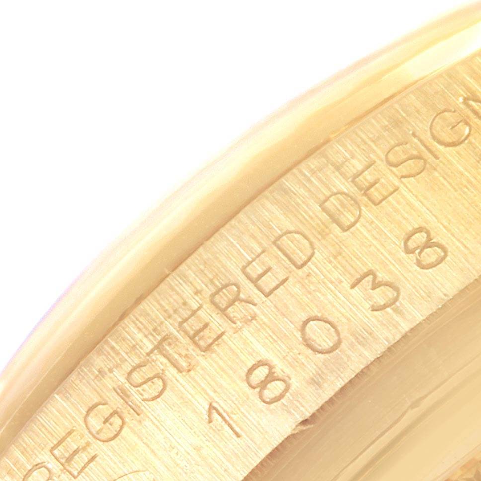 This image shows a close-up of the case engraving on a Rolex President 18038 Men
s Yellow Gold Champagne Dial 18038 Men
s Yellow Gold Champagne Dial model watch, highlighting the model number.