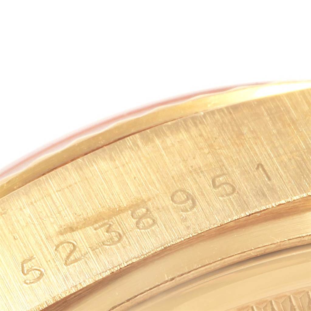 This image shows a close-up of the serial number engraved on the gold case of a Rolex President 18038 Men
s Yellow Gold Champagne Dial 18038 Men
s Yellow Gold Champagne Dial model watch.