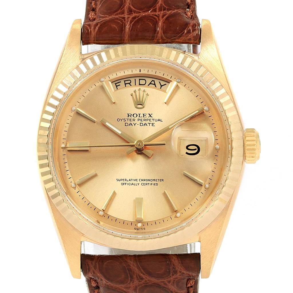 This image shows a frontal view of the Rolex President 1803 Men's Yellow Gold Champagne Dial 1803 Men's Yellow Gold Champagne Dial Day-Date watch, highlighting its face, dial, hands, and brown leather strap.