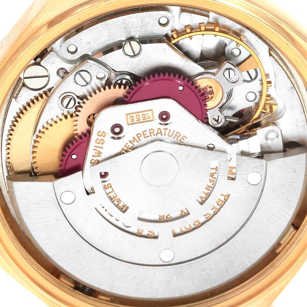 The image shows the intricate internal movement mechanism of a Rolex President 1803 Men's Yellow Gold Champagne Dial 1803 Men's Yellow Gold Champagne Dial model watch viewed from the back.