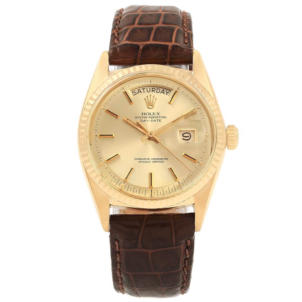 This image shows a front view of a Rolex Day-Date President watch with a gold case and brown alligator leather strap.