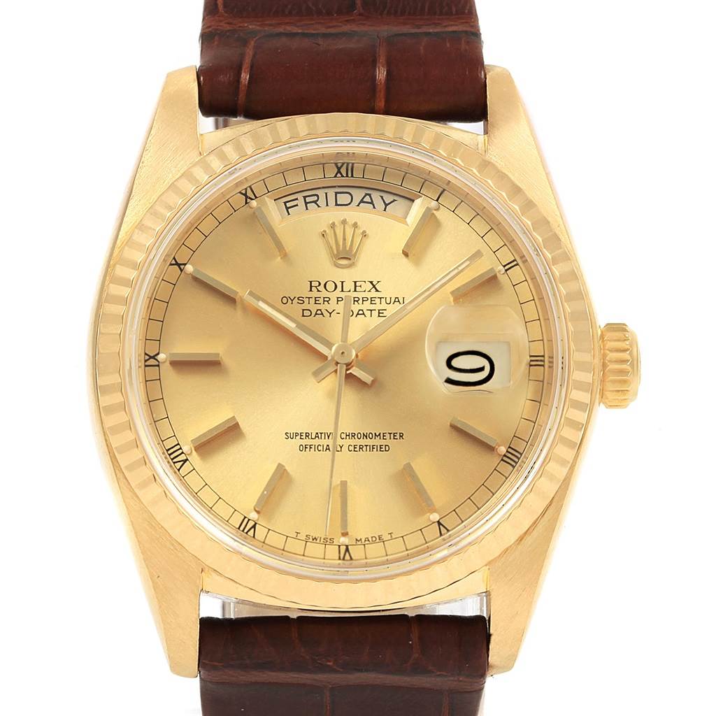 This is a close-up front view of a Rolex President 18038 Men
s Yellow Gold Champagne Dial 18038 Men
s Yellow Gold Champagne Dial model watch, showing the dial, day-date display, and leather strap.