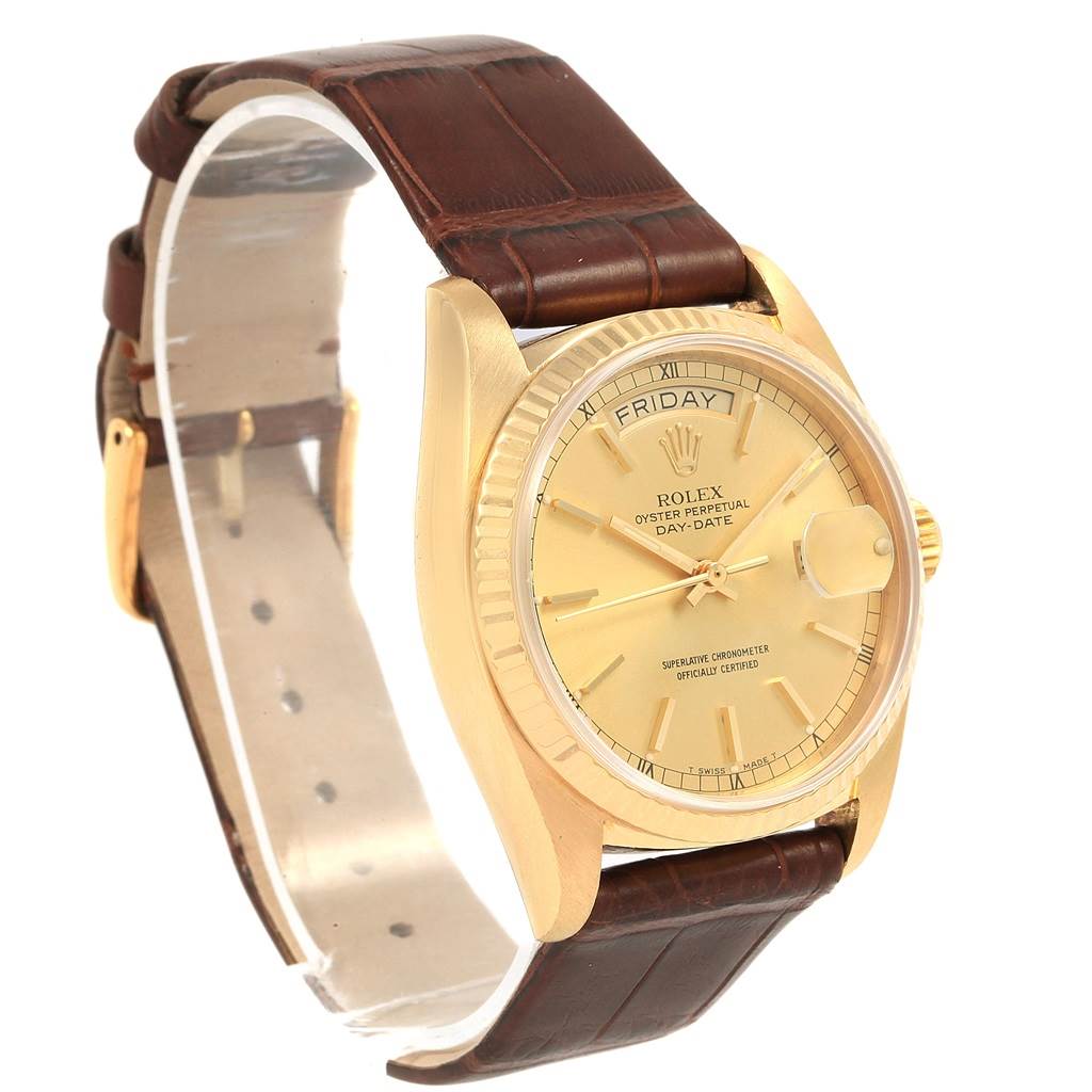 The Rolex President 18038 Men
s Yellow Gold Champagne Dial 18038 Men
s Yellow Gold Champagne Dial model watch is shown at a slightly angled front view, displaying its face, leather band, and gold case.