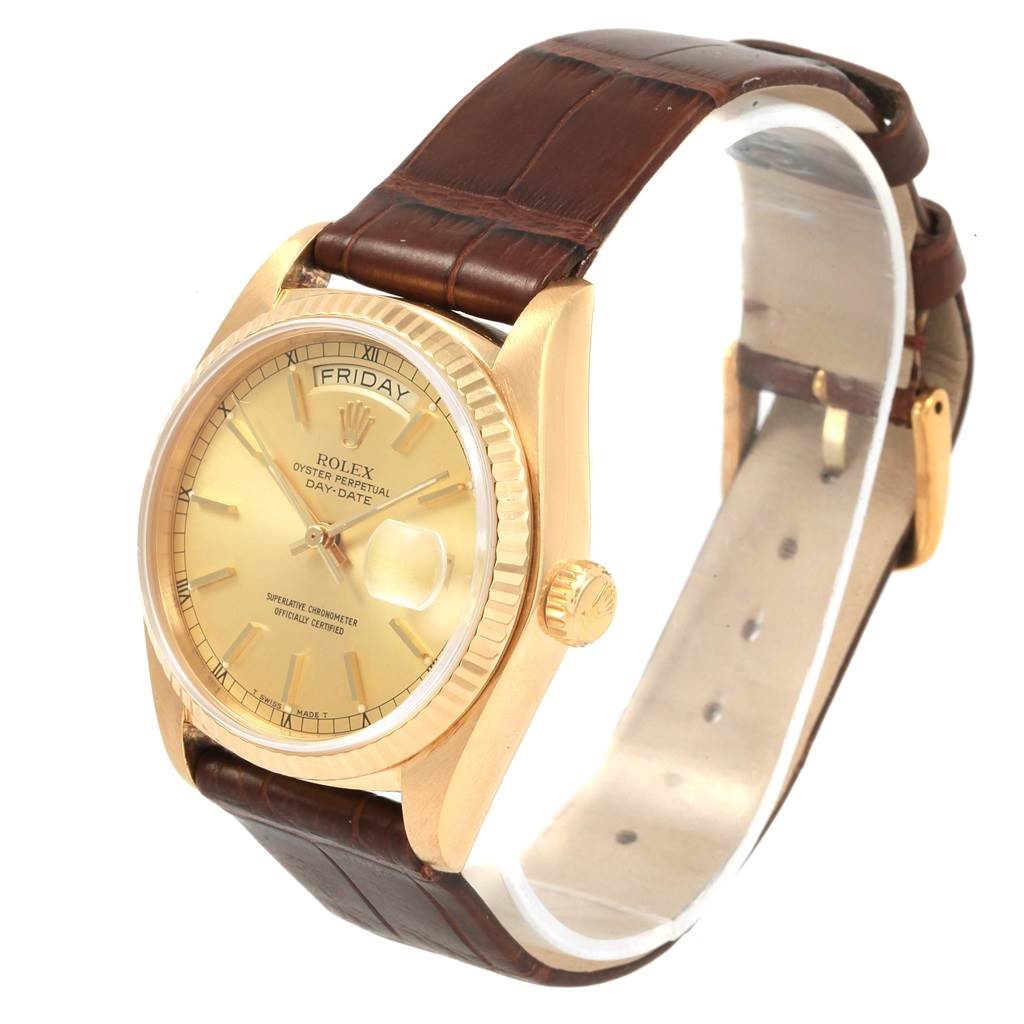 The Rolex President 18038 Men
s Yellow Gold Champagne Dial 18038 Men
s Yellow Gold Champagne Dial model watch is shown at a three-quarter angle, displaying the dial, crown, and leather strap.