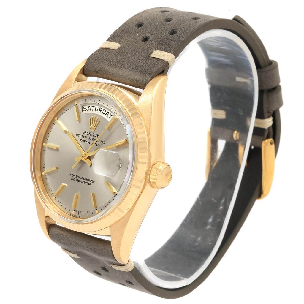 The image shows a Rolex President 1803 Men
s Yellow Gold Champagne Dial 1803 Men
s Yellow Gold Champagne Dial model watch, angled showing the dial, bezel, crown, case, and perforated leather strap.