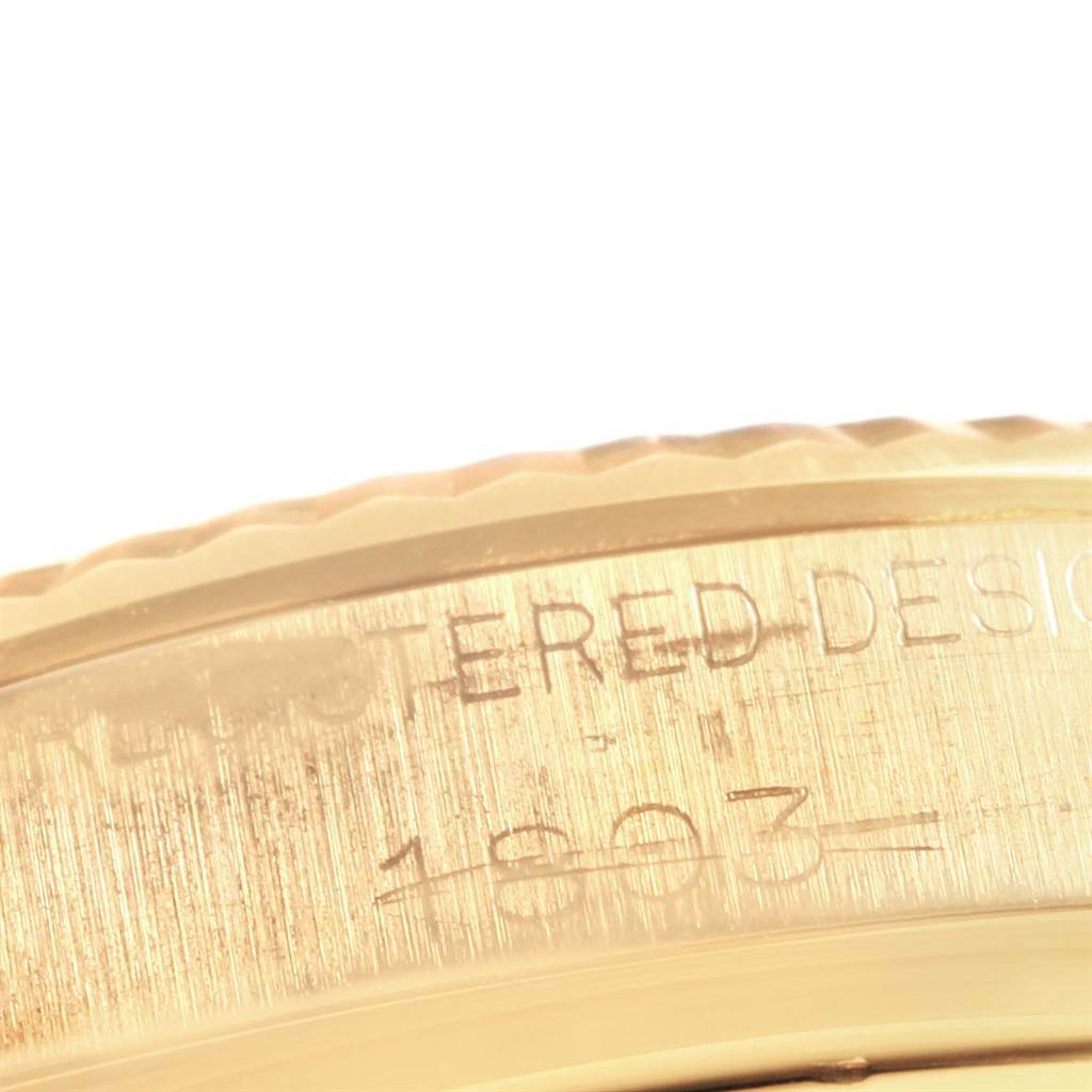 The image shows a close-up of the serial number engraving on the bezel of a Rolex President 1803 Men
s Yellow Gold Champagne Dial 1803 Men
s Yellow Gold Champagne Dial model watch.