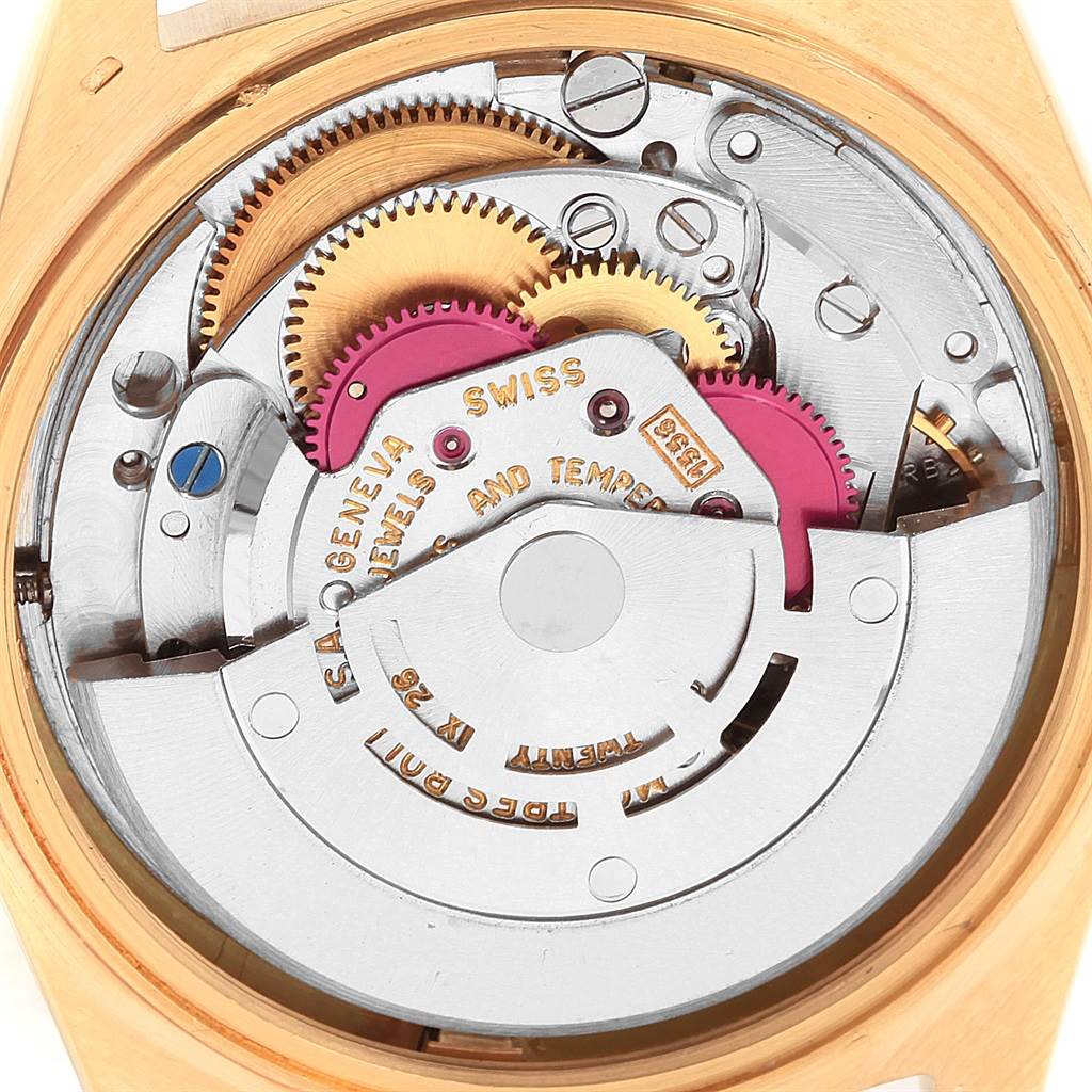 This image shows the intricate movement of the Rolex President 1803 Men
s Yellow Gold Champagne Dial 1803 Men
s Yellow Gold Champagne Dial model watch, focusing on gears and mechanical components.