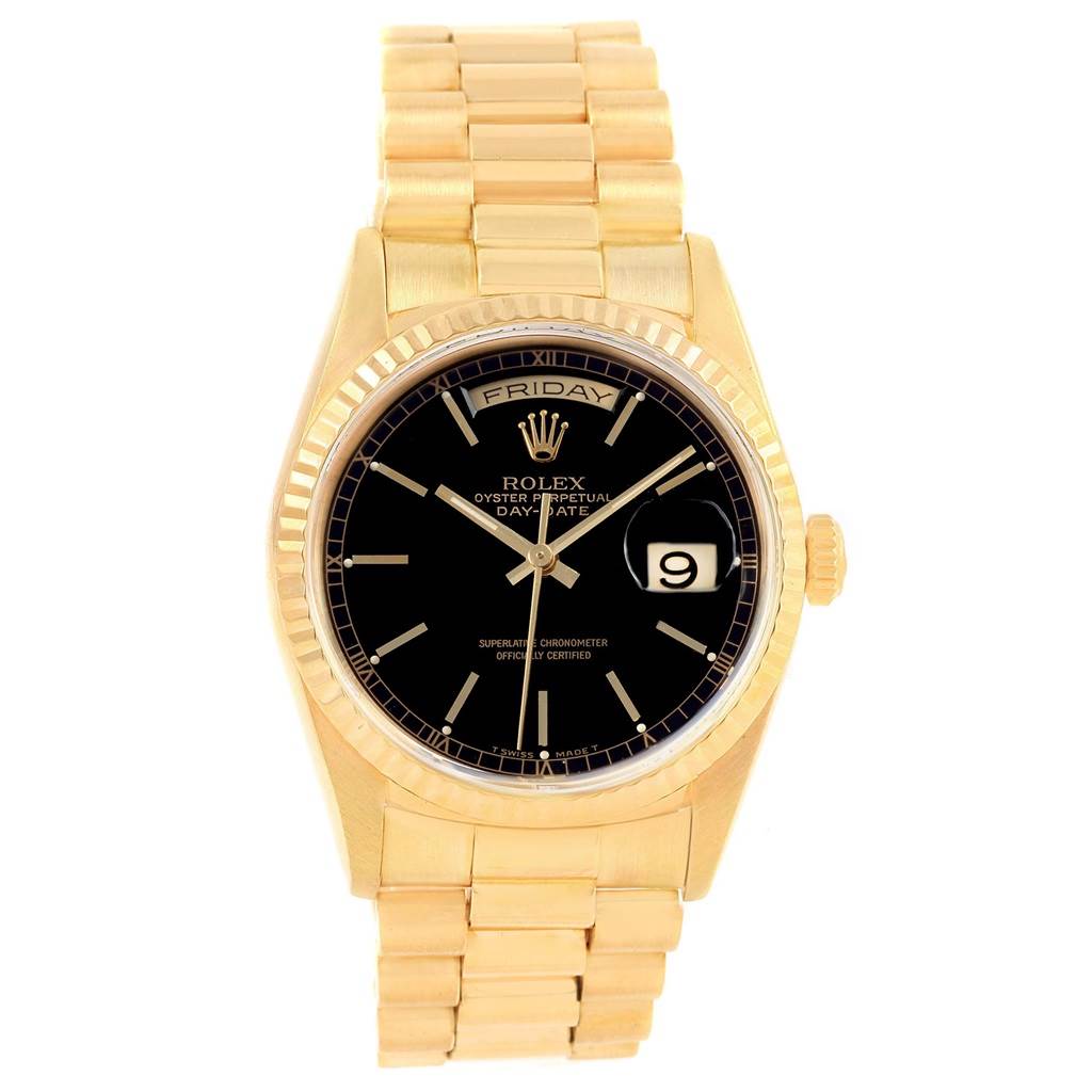 The image shows a front view of the Rolex President 18238 Men
s Yellow Gold Black Dial 18238 Men
s Yellow Gold Black Dial model, displaying the watch face, hands, crown, and the day-date window.