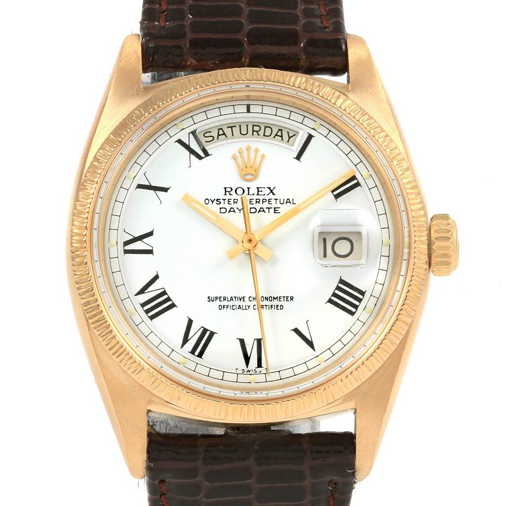 The image shows a front view of the Rolex President 1807 Men
s Yellow Gold White Dial 1807 Men
s Yellow Gold White Dial Day-Date watch, featuring its dial, bezel, and crown.