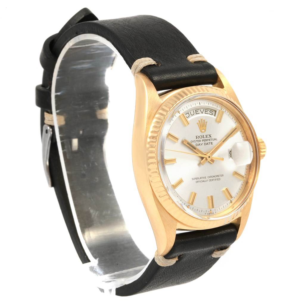 The image shows a Rolex President 1803 Men
s Yellow Gold Silver Dial 1803 Men
s Yellow Gold Silver Dial model watch with a gold case, black leather strap, and white dial, viewed from a three-quarter angle.