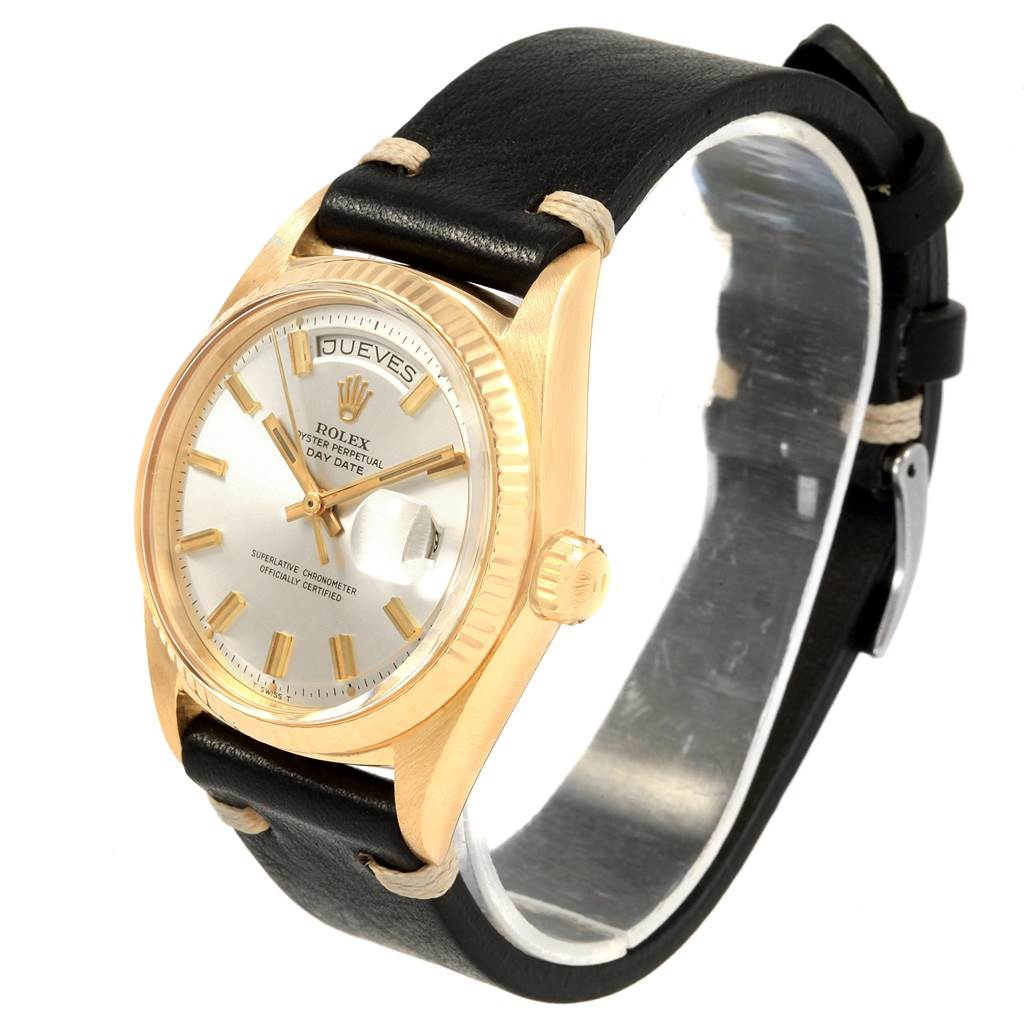 This image shows a Rolex President 1803 Men
s Yellow Gold Silver Dial 1803 Men
s Yellow Gold Silver Dial model watch at a three-quarter angle, highlighting its dial, bezel, crown, and leather strap.