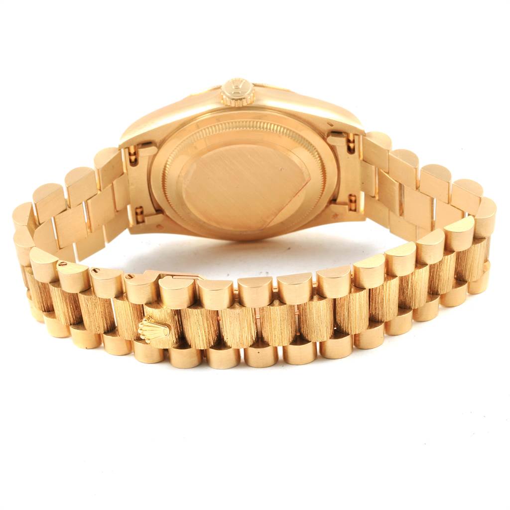The image shows the back of a Rolex President 18248 Men
s Yellow Gold Champagne Dial 18248 Men
s Yellow Gold Champagne Dial model watch, highlighting its gold case and bracelet.