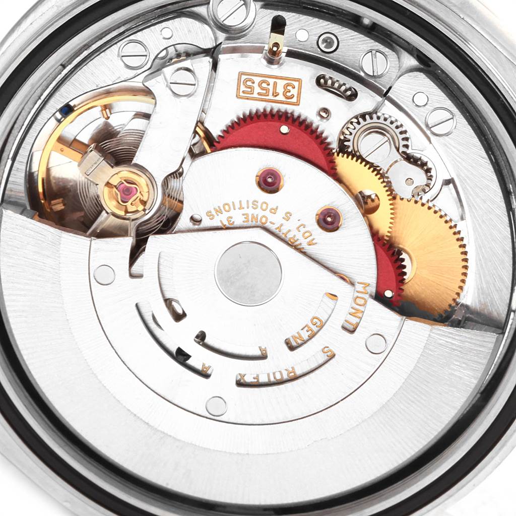 This image shows a close-up view of the internal movement of a Rolex President 118239 Men's White Gold Silver Dial 118239 Men's White Gold Silver Dial model watch, focusing on its intricate gears and components.