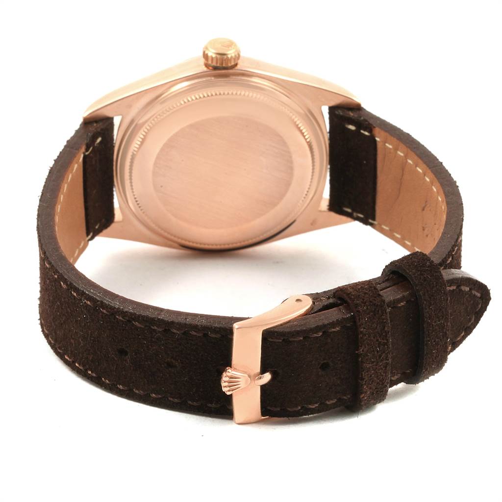 The image shows the back case and leather strap, including the buckle, of the Rolex President 1803 Men's Rose Gold Pink Dial 1803 Men's Rose Gold Pink Dial model watch.