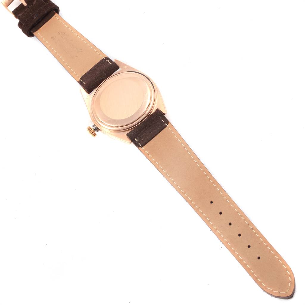 The image shows the back view of the Rolex President 1803 Men's Rose Gold Pink Dial 1803 Men's Rose Gold Pink Dial model watch with its leather strap fully extended.