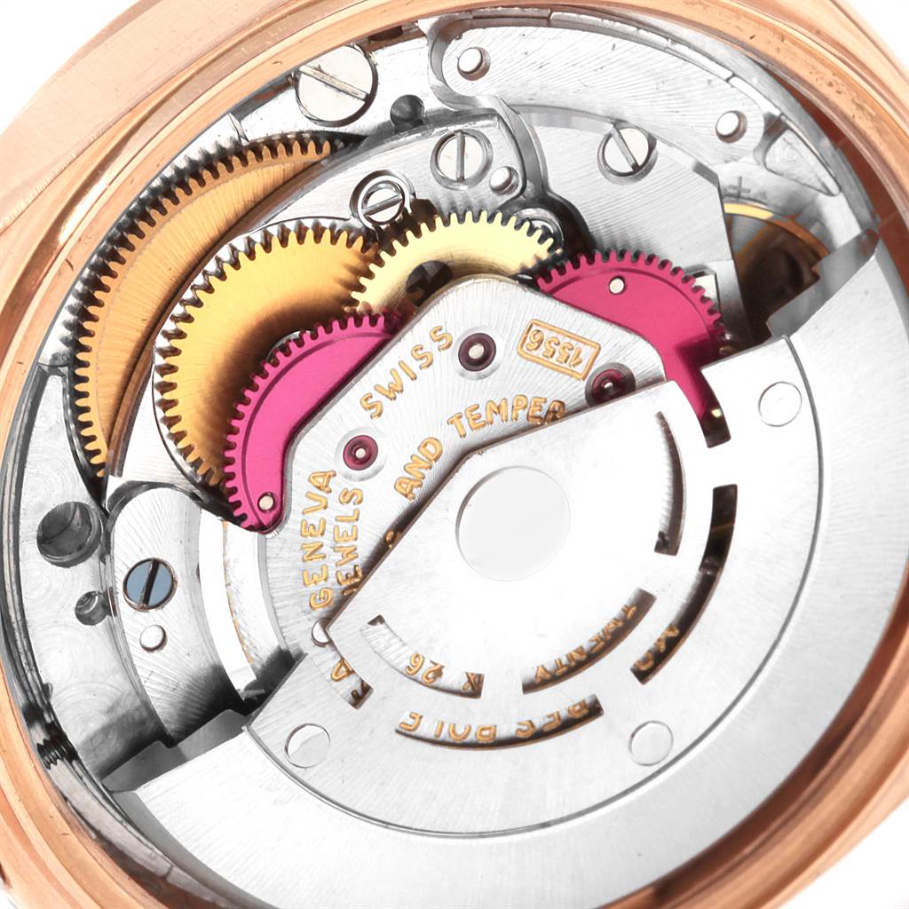This image shows the internal mechanical movement and gears of a Rolex President 1803 Men's Rose Gold Pink Dial 1803 Men's Rose Gold Pink Dial model watch.