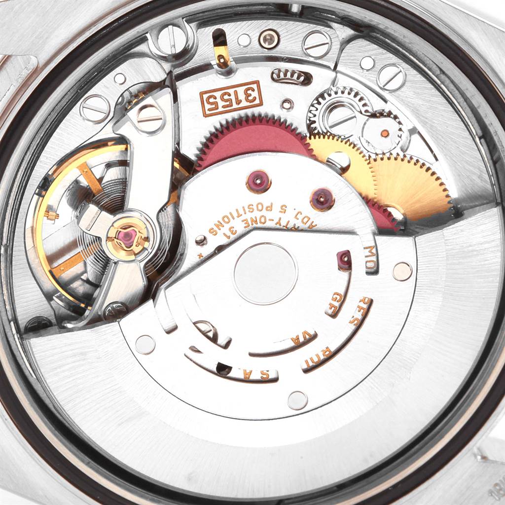 The image shows a close-up of the movement and internal mechanisms of the Rolex President 118239 Men's White Gold Silver Dial 118239 Men's White Gold Silver Dial model watch.