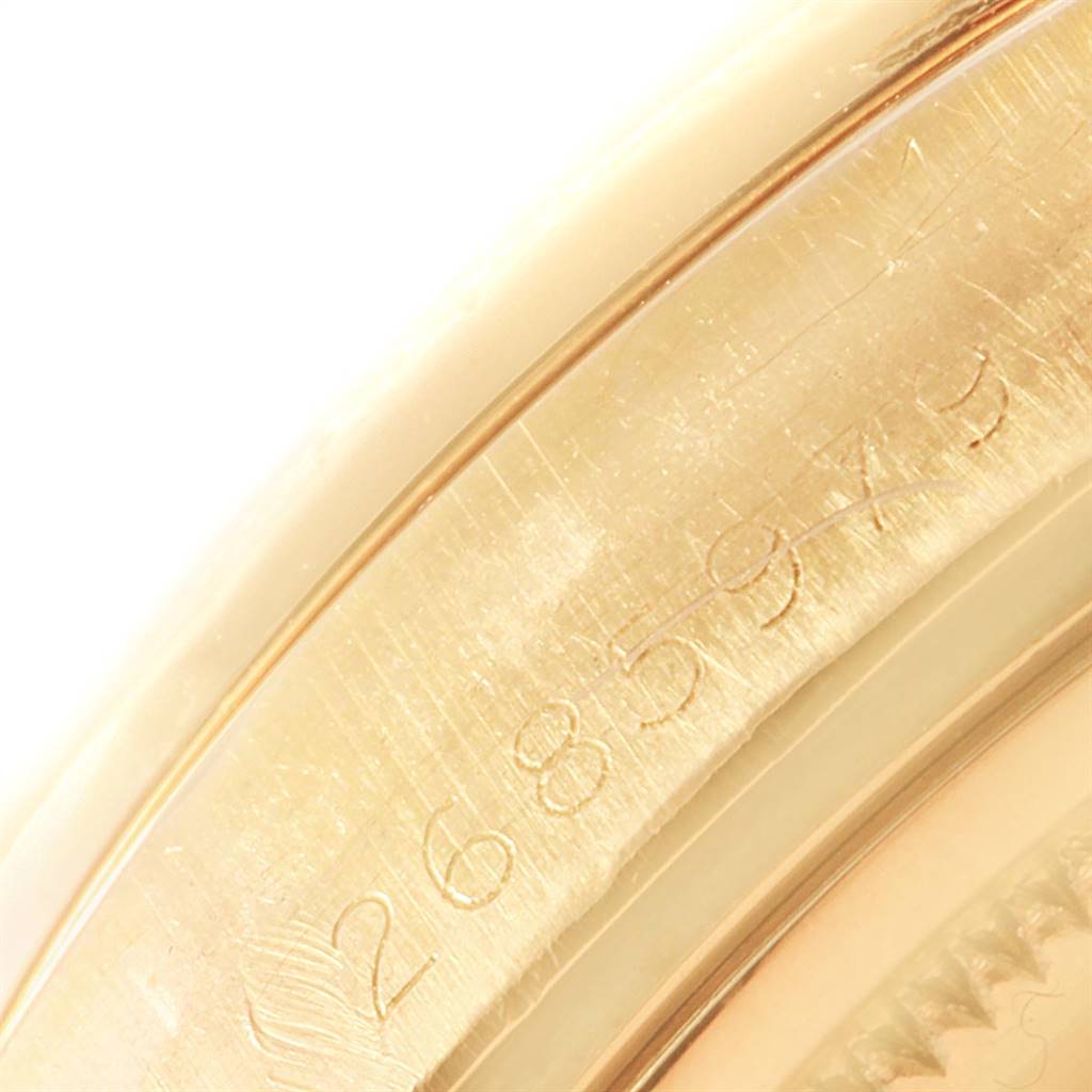 This image shows a close-up of the serial number engraved on the inner bezel of a Rolex President 1807 Men
s Yellow Gold Champagne Dial 1807 Men
s Yellow Gold Champagne Dial watch.