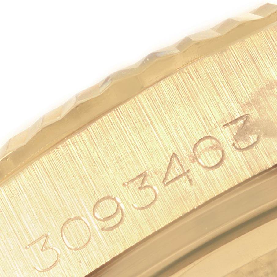 This close-up image shows the edge and part of the serial number engraved on the case of a Rolex President 1803 Men
s Yellow Gold Champagne Dial 1803 Men
s Yellow Gold Champagne Dial model watch.