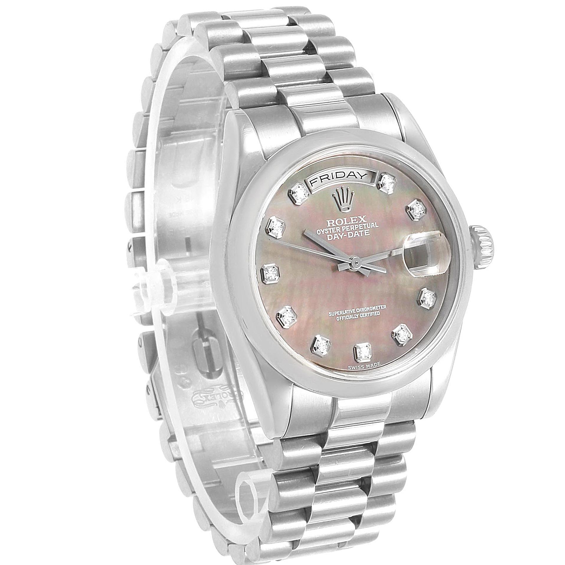 The image shows a Rolex President 118209 Men's White Gold Mother of Pearl Dial 118209 Men's White Gold Mother of Pearl Dial model watch from an angled front view, highlighting the bracelet, dial, and day-date display.