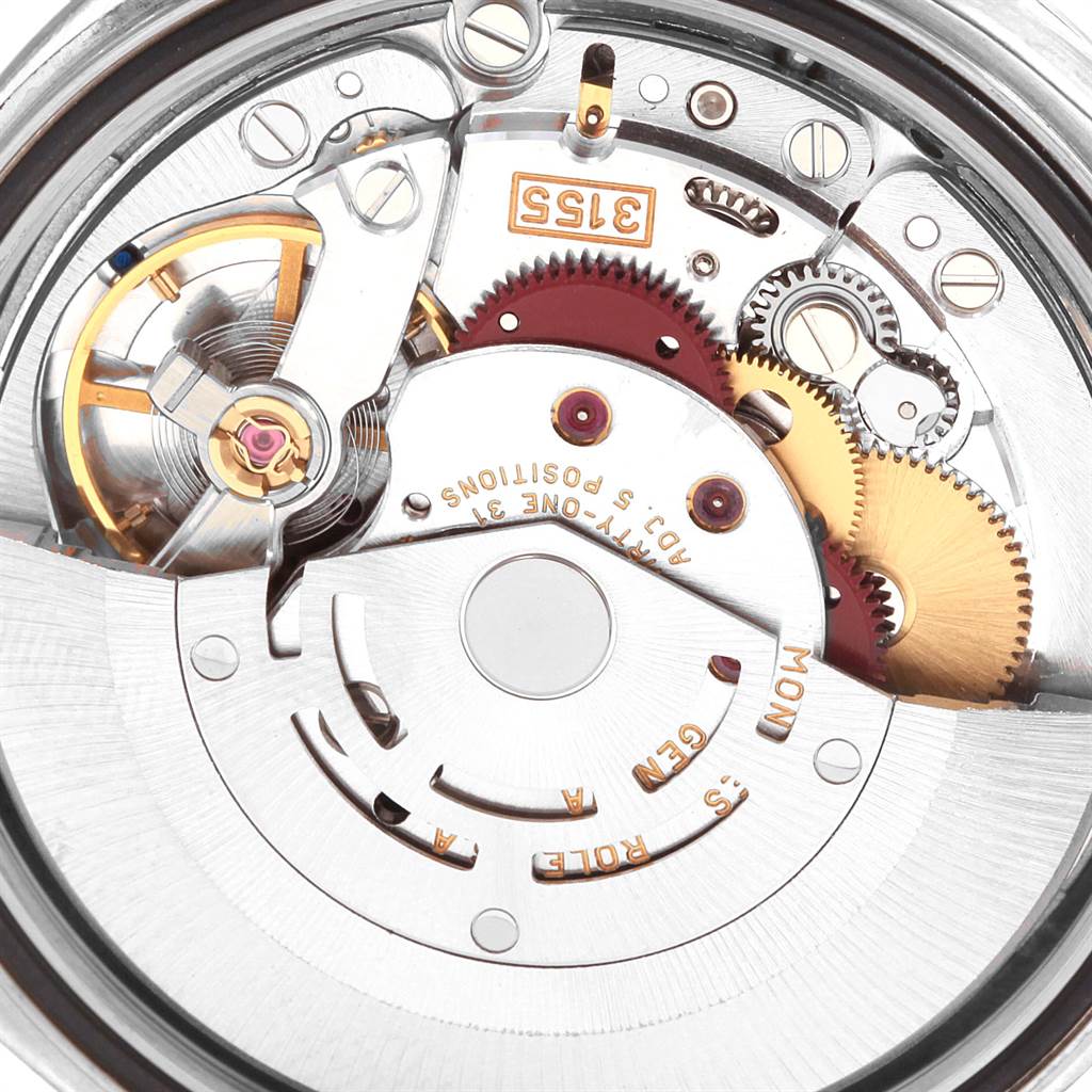 This image shows the intricate internal mechanism of the Rolex President 118209 Men's White Gold Mother of Pearl Dial 118209 Men's White Gold Mother of Pearl Dial model watch at a close-up angle.