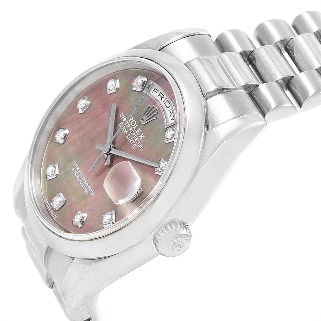 The image shows a Rolex President 118209 Men's White Gold Mother of Pearl Dial 118209 Men's White Gold Mother of Pearl Dial watch at an angle highlighting the dial, crown, and part of the bracelet.
