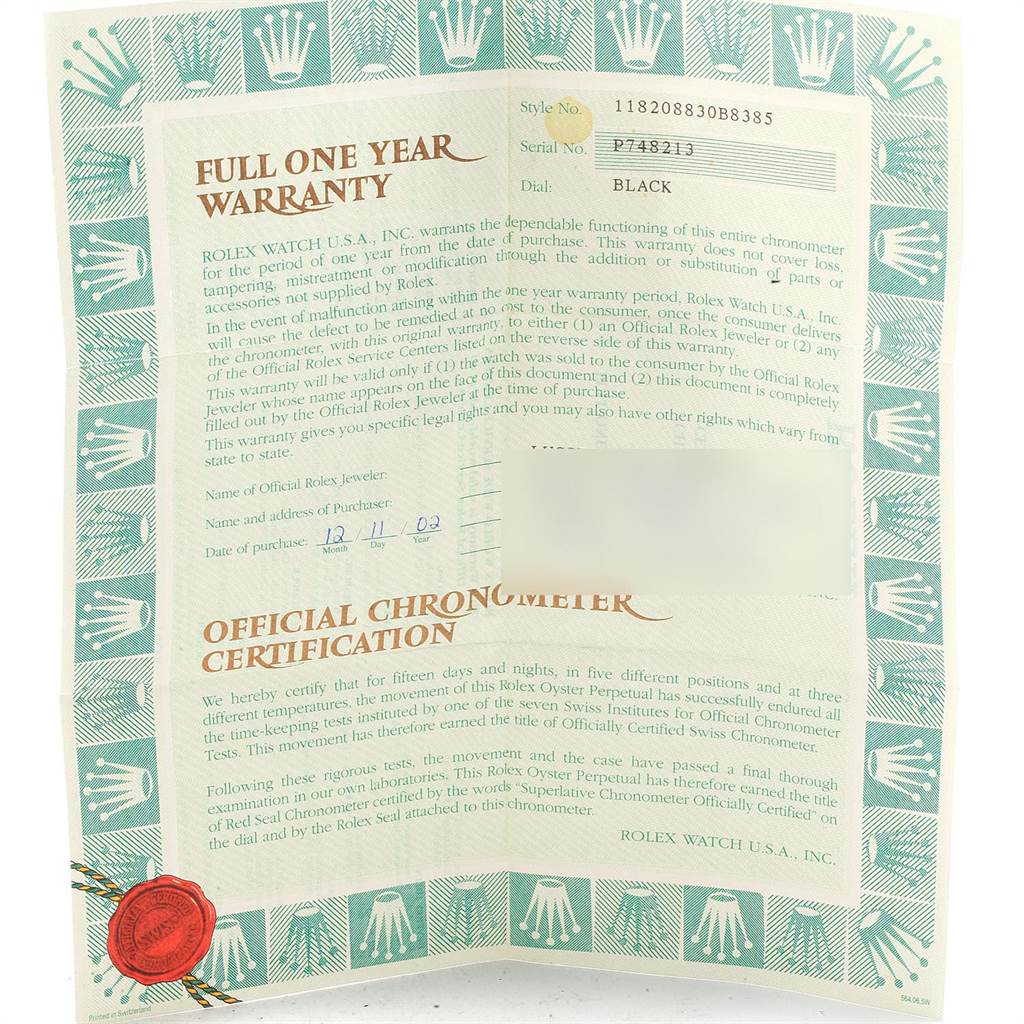 This image shows the warranty and certification documents for a Rolex President 118208 Men
s Yellow Gold Black Dial 118208 Men
s Yellow Gold Black Dial model watch.