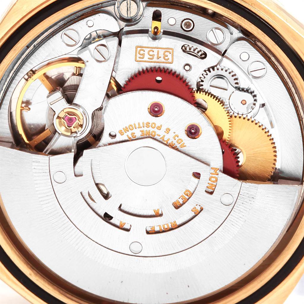 The image shows the internal mechanism of the President model by Rolex from the back angle.