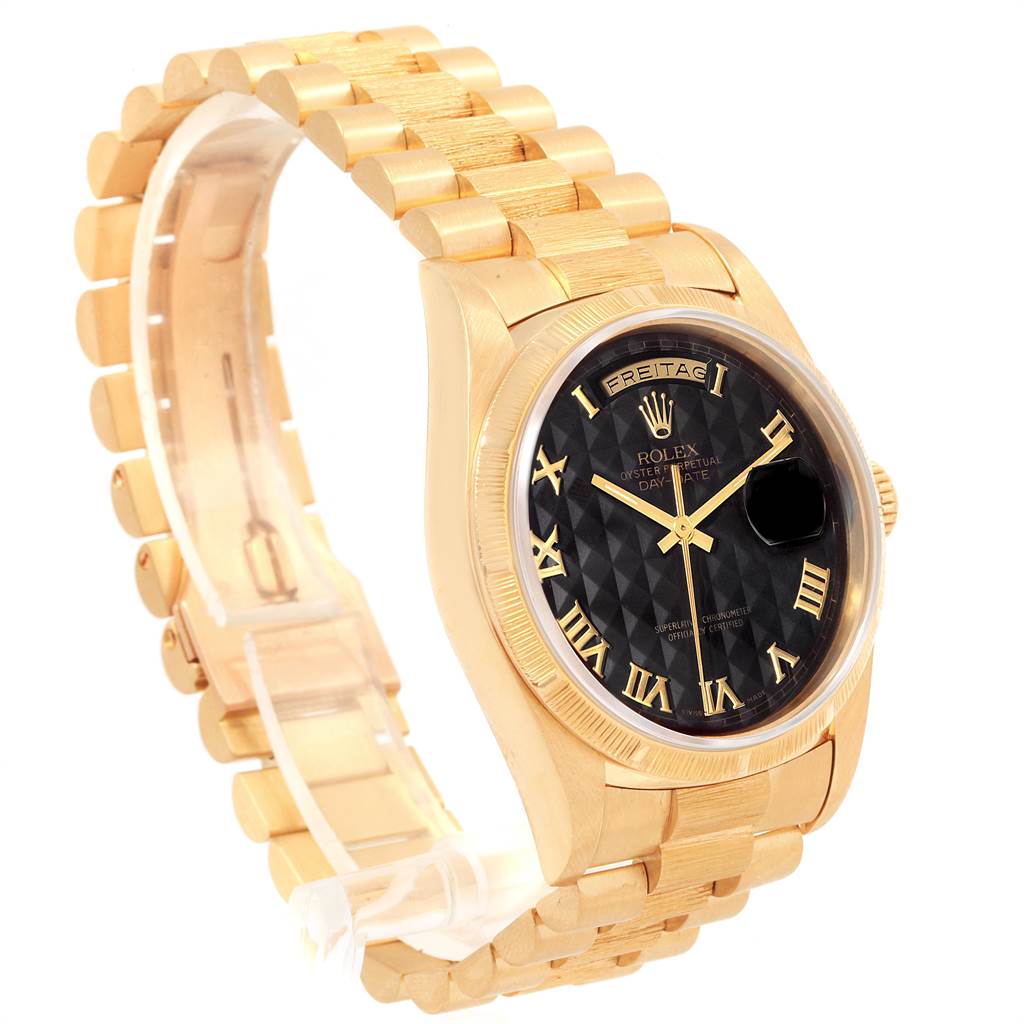 The image shows a side angle of a gold Rolex President 18248 Men
s Yellow Gold Black Dial 18248 Men
s Yellow Gold Black Dial model watch, featuring its band, dial, and bezel.