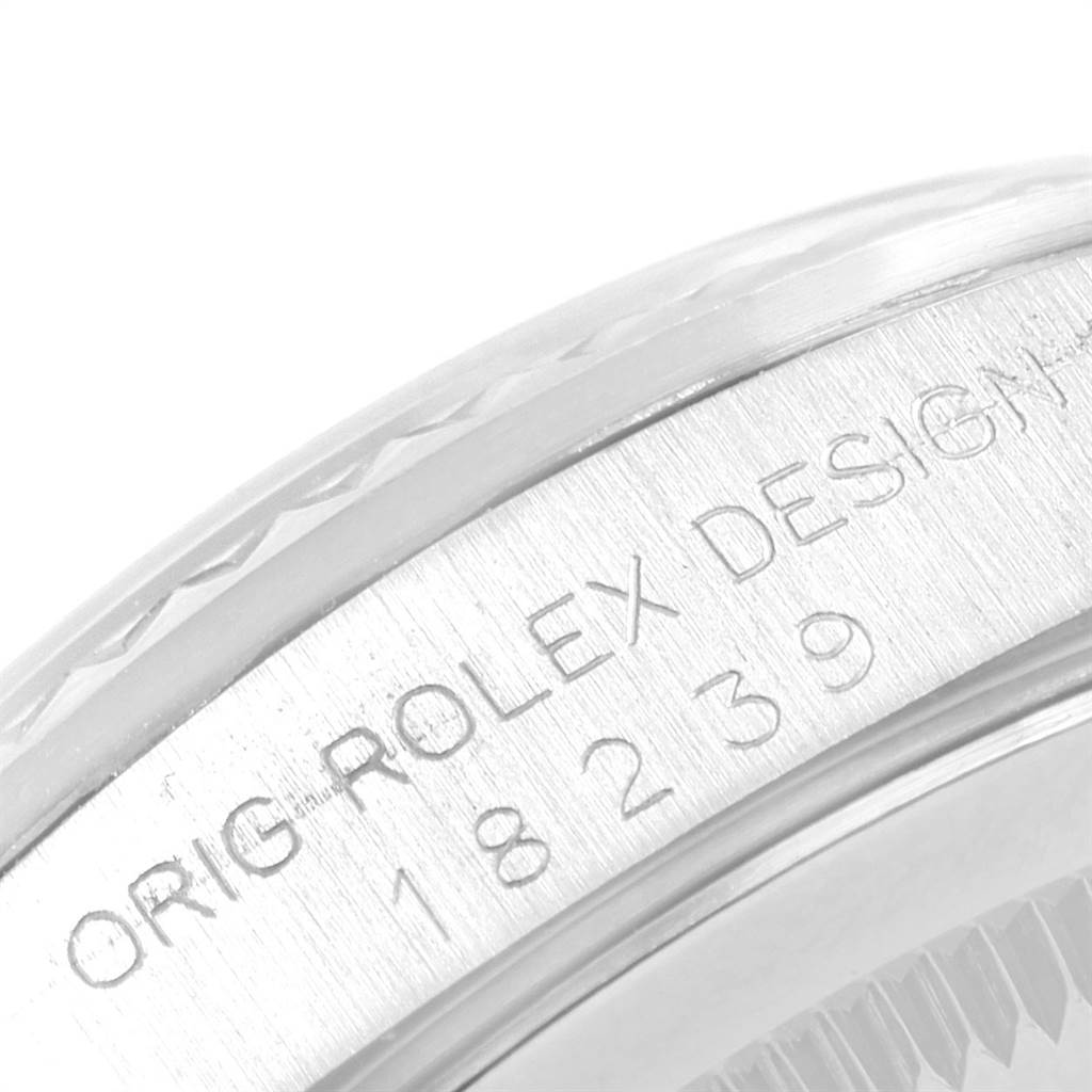 The image shows a close-up of the case side of a Rolex President 18239 Men's White Gold Silver Dial 18239 Men's White Gold Silver Dial model watch with engraved text.