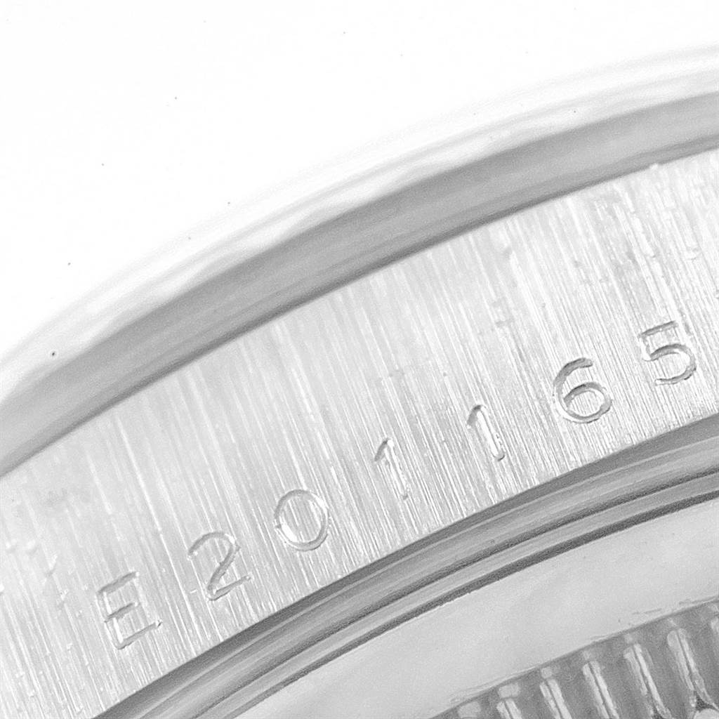 Close-up shot showing the serial number engraving on the edge of the Rolex President 18239 Men's White Gold Silver Dial 18239 Men's White Gold Silver Dial model watch casing.