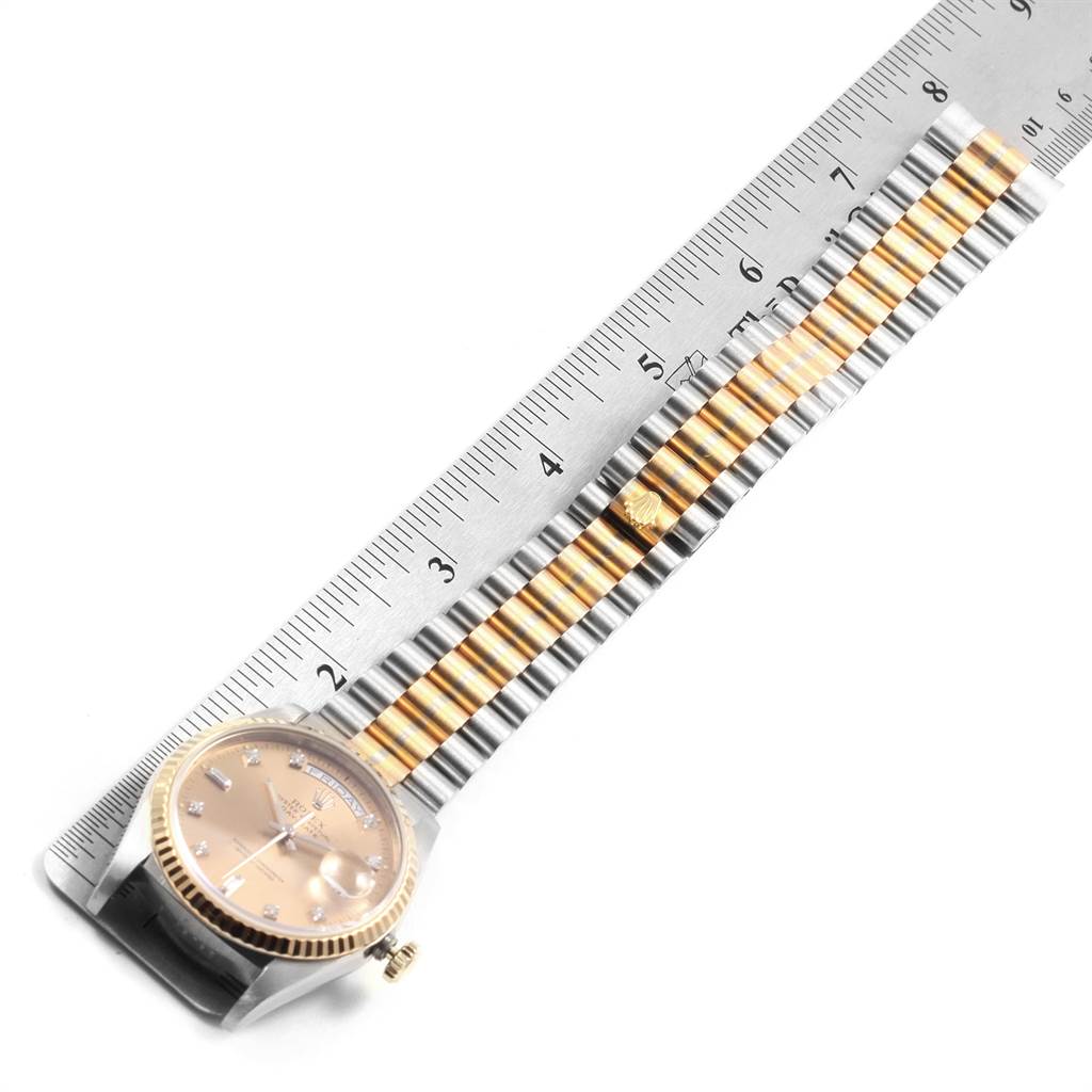 The image shows a Rolex President 18239 Men's White Gold Brown Dial 18239 Men's White Gold Brown Dial model watch laid flat, with its face and bracelet in full view alongside a ruler for scale.