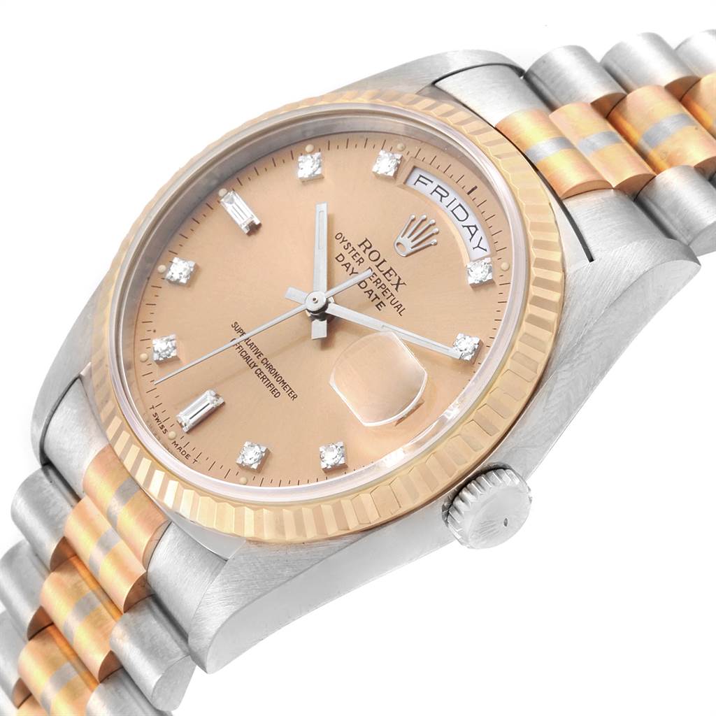 This image shows a close-up of the Rolex President 18239 Men's White Gold Brown Dial 18239 Men's White Gold Brown Dial Day-Date model, highlighting the dial, bezel, crown, and part of the bracelet at an angled view.