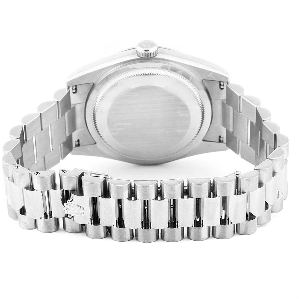 This image shows the back case and bracelet of the Rolex President 118209 Men's White Gold Black Dial 118209 Men's White Gold Black Dial model watch from a rear view angle.